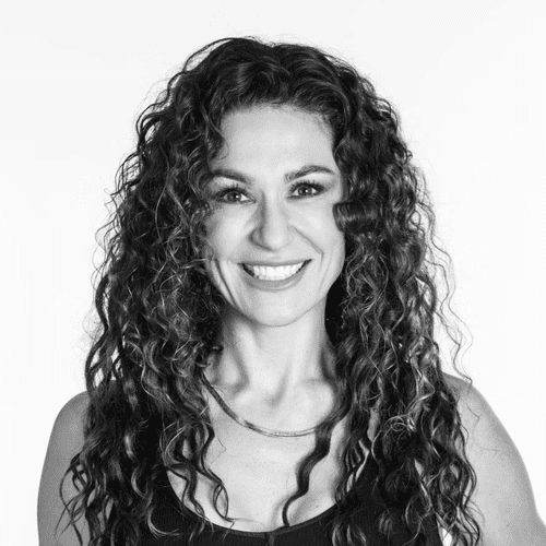 Portrait of Gena Mazzamuto, a professional stylist at Dominic Michael Salon, showcasing their expertise and style.