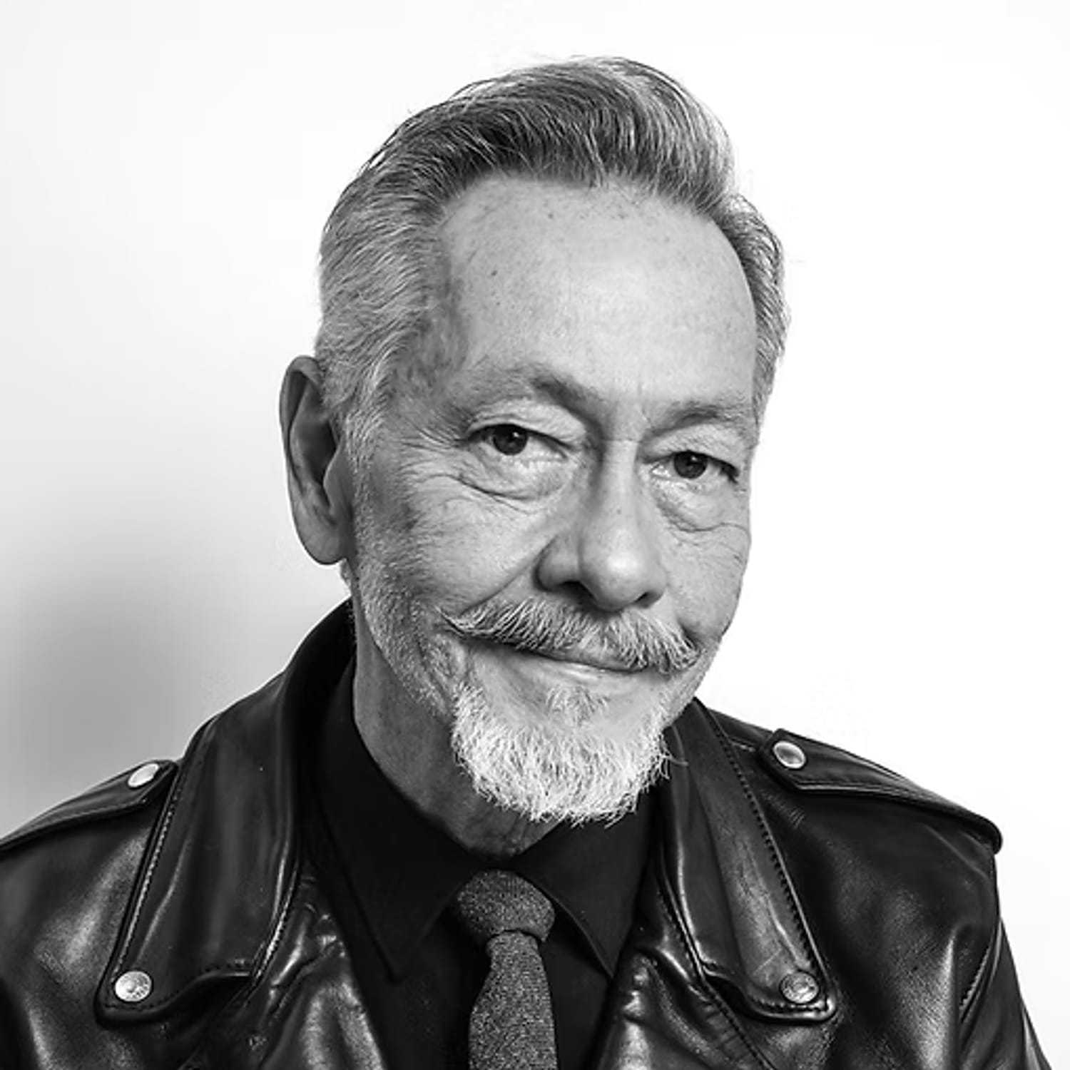 Portrait of Colton Blake, a professional stylist at Dominic Michael Salon, showcasing their expertise and style.