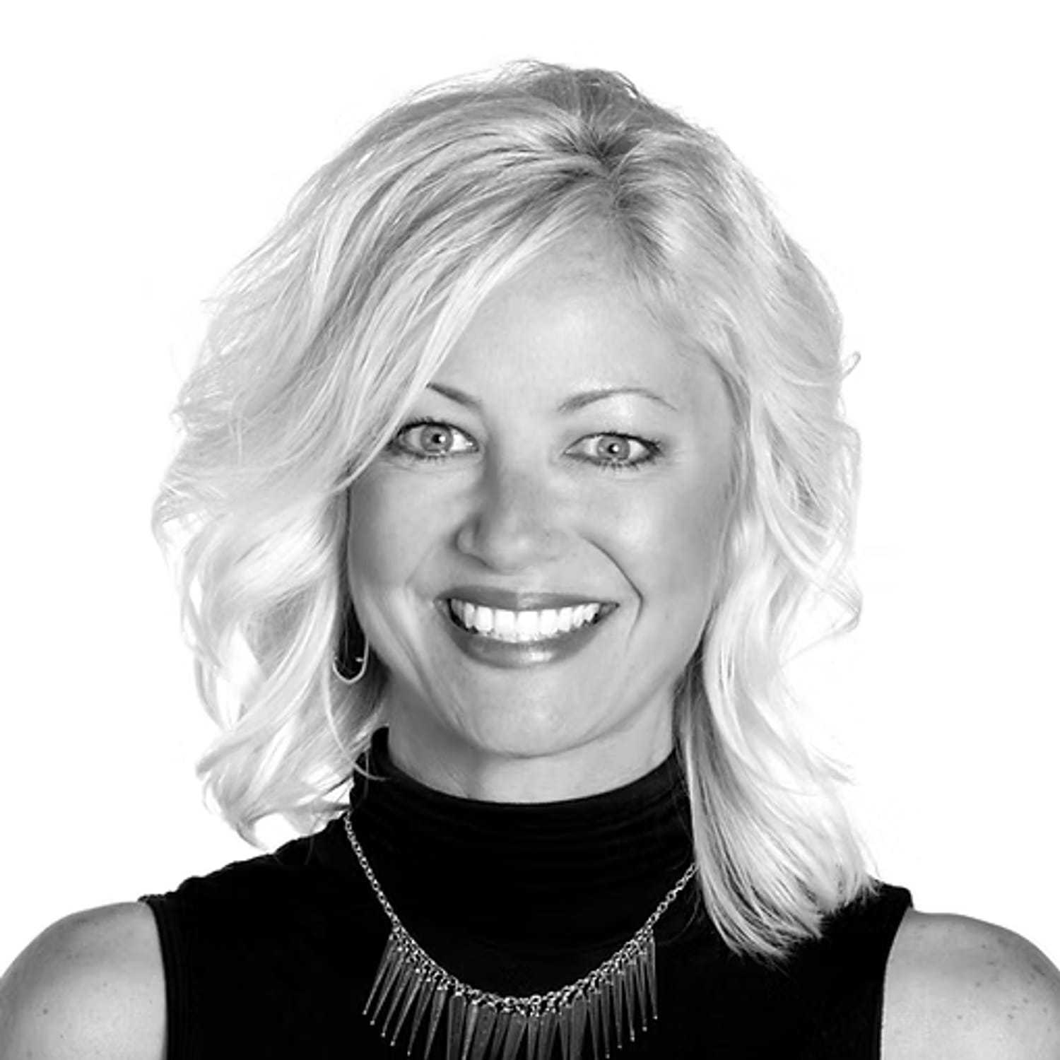 Portrait of Jeana Klump, a professional stylist at Dominic Michael Salon, showcasing their expertise and style.