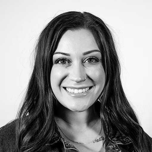 Portrait of Janice Kohlfeld, a professional stylist at Dominic Michael Salon, showcasing their expertise and style.