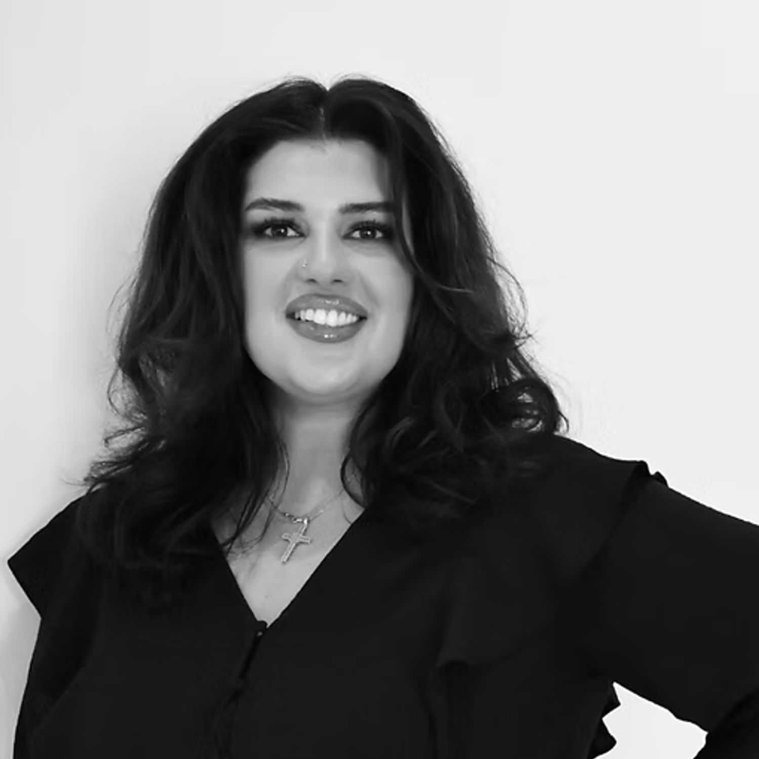 Portrait of Eliza Vancheva, a professional stylist at Dominic Michael Salon, showcasing their expertise and style.