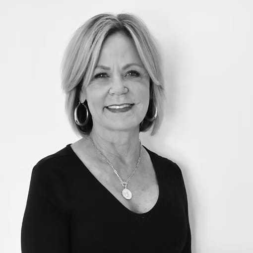 Portrait of Jill Alane, a professional stylist at Dominic Michael Salon, showcasing their expertise and style.