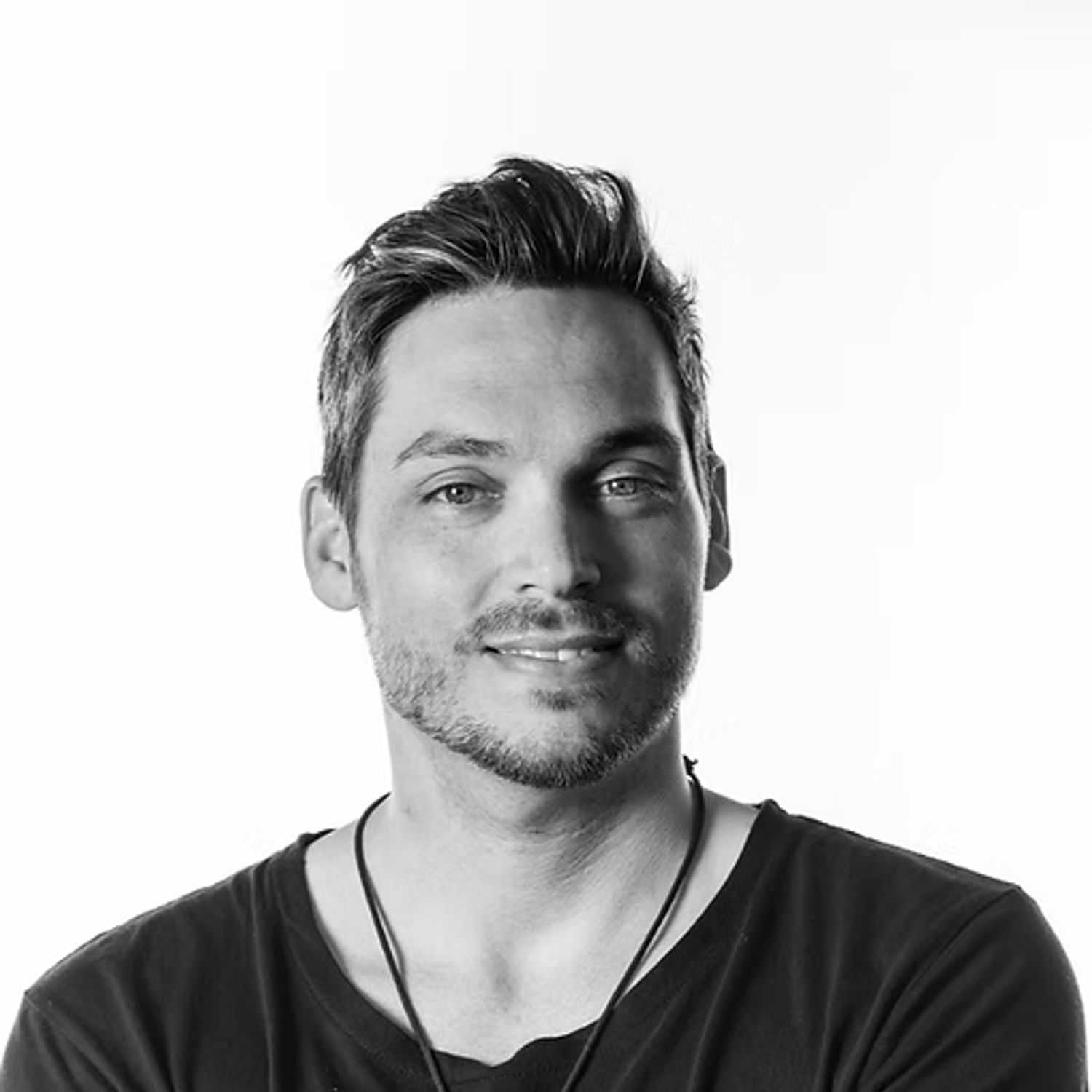 Portrait of Lucas Landers, a professional stylist at Dominic Michael Salon, showcasing their expertise and style.