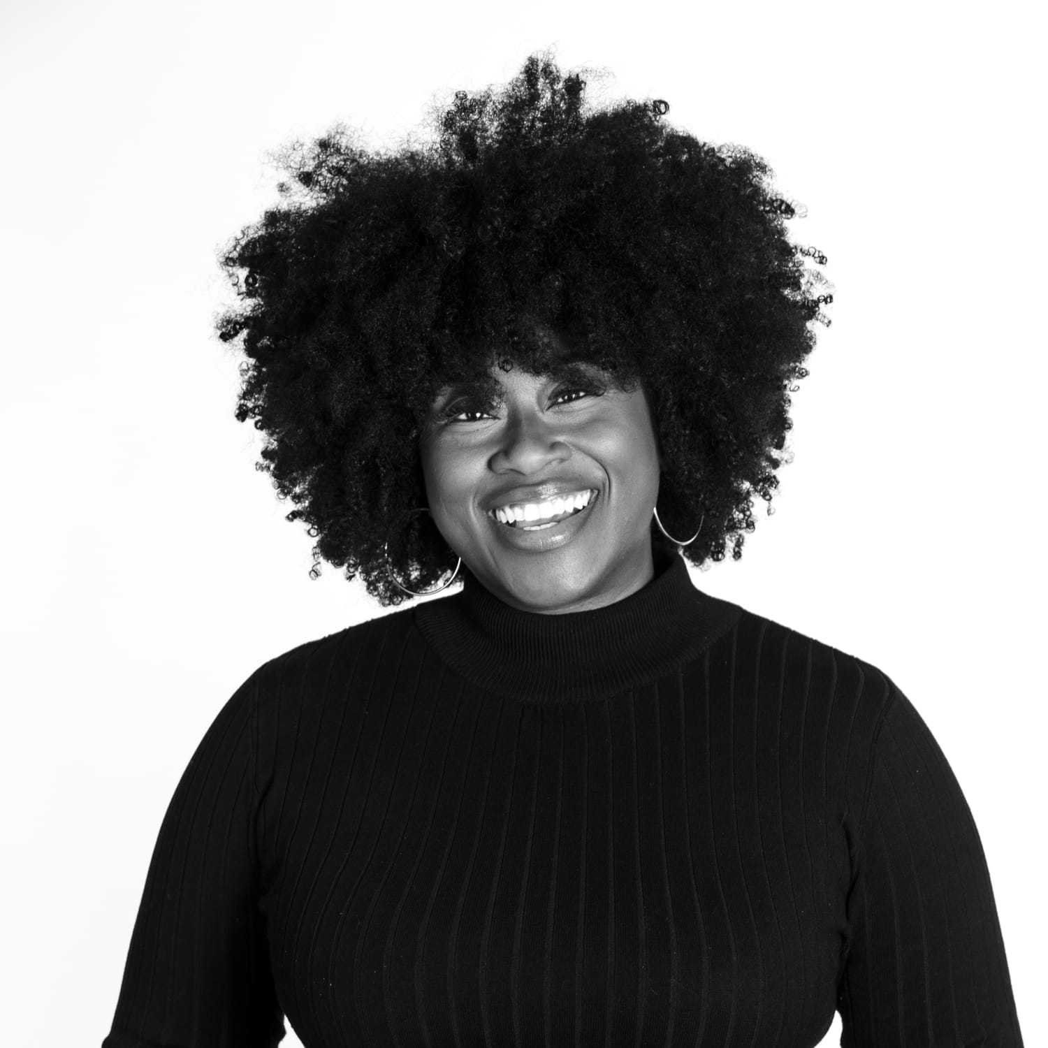 Portrait of Teresa Scruggs, a professional stylist at Dominic Michael Salon, showcasing their expertise and style.