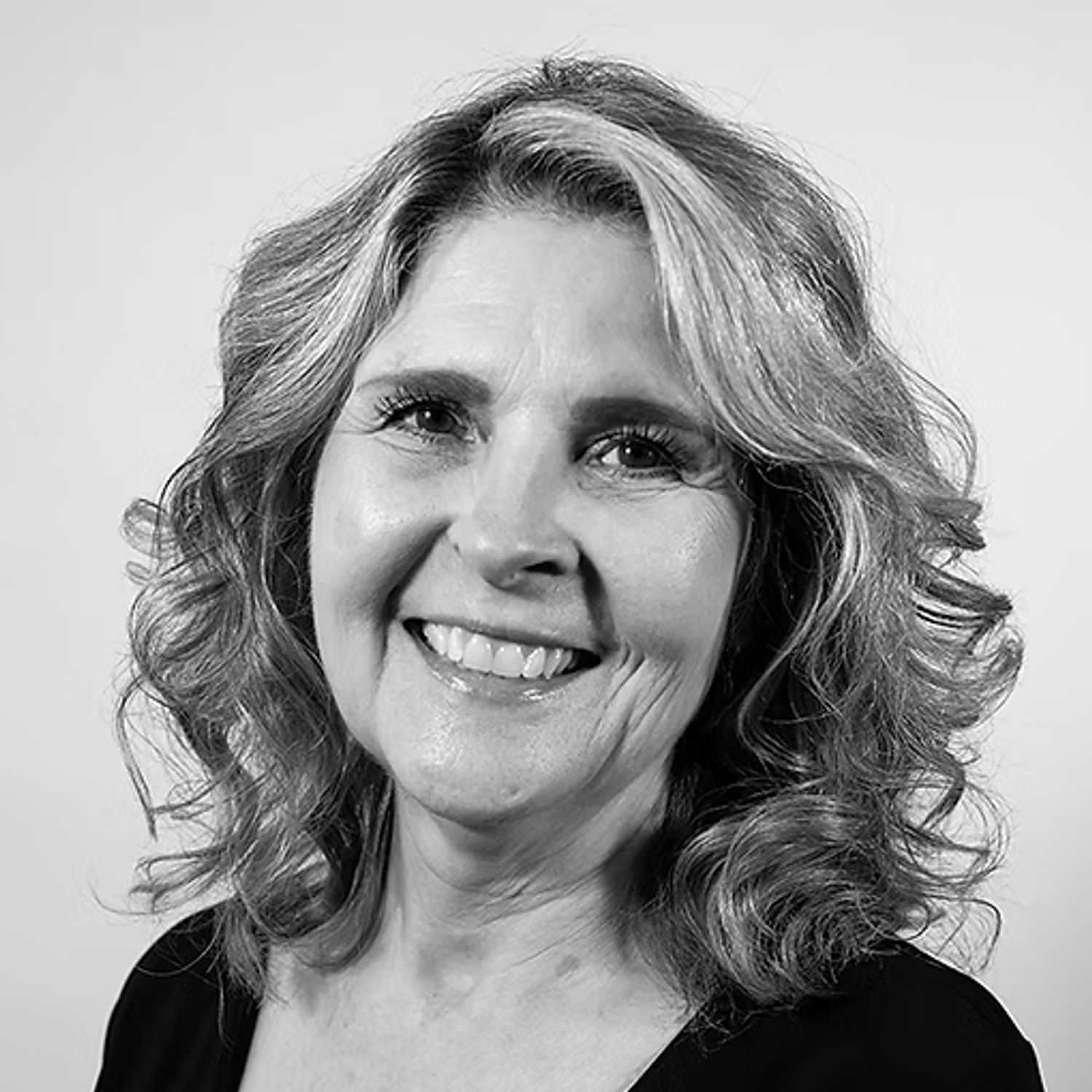 Portrait of Helen Pollak, a professional stylist at Dominic Michael Salon, showcasing their expertise and style.