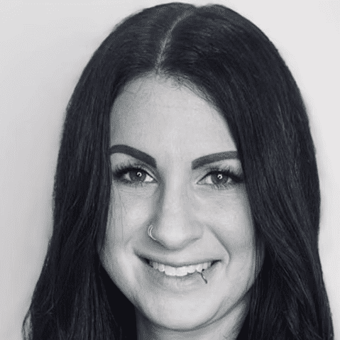 Portrait of Elisabeth (Lis) Schemerhorn, a professional stylist at Dominic Michael Salon, showcasing their expertise and style.