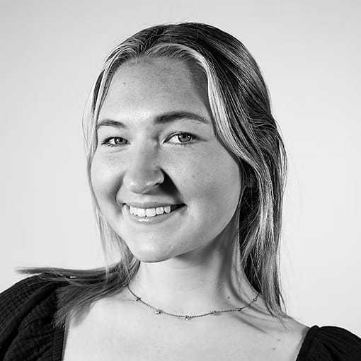 Portrait of Emily Thum, a professional stylist at Dominic Michael Salon, showcasing their expertise and style.