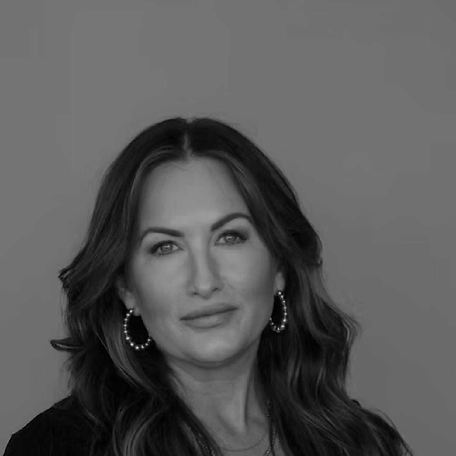 Portrait of Amanda Dedert, a professional stylist at Dominic Michael Salon, showcasing their expertise and style.