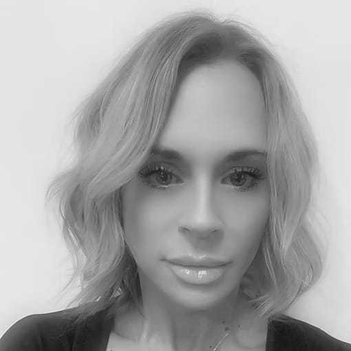 Portrait of Ashley Weymouth, a professional stylist at Dominic Michael Salon, showcasing their expertise and style.