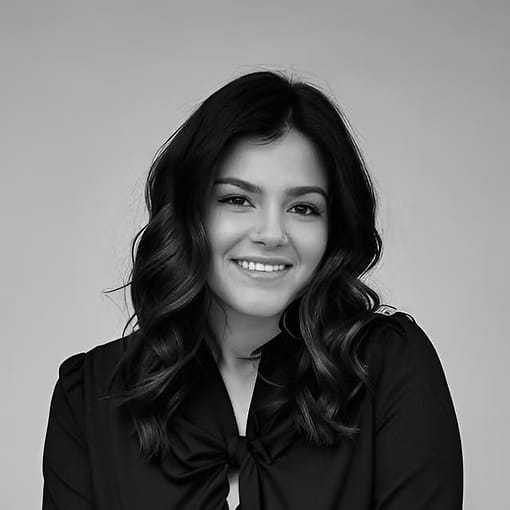 Portrait of Olivia Koppel, a professional stylist at Dominic Michael Salon, showcasing their expertise and style.