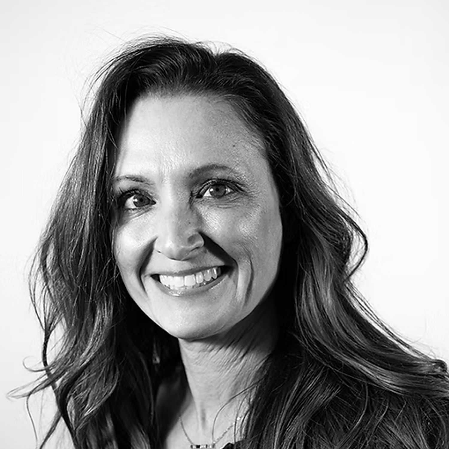 Portrait of Jill Warden, a professional stylist at Dominic Michael Salon, showcasing their expertise and style.