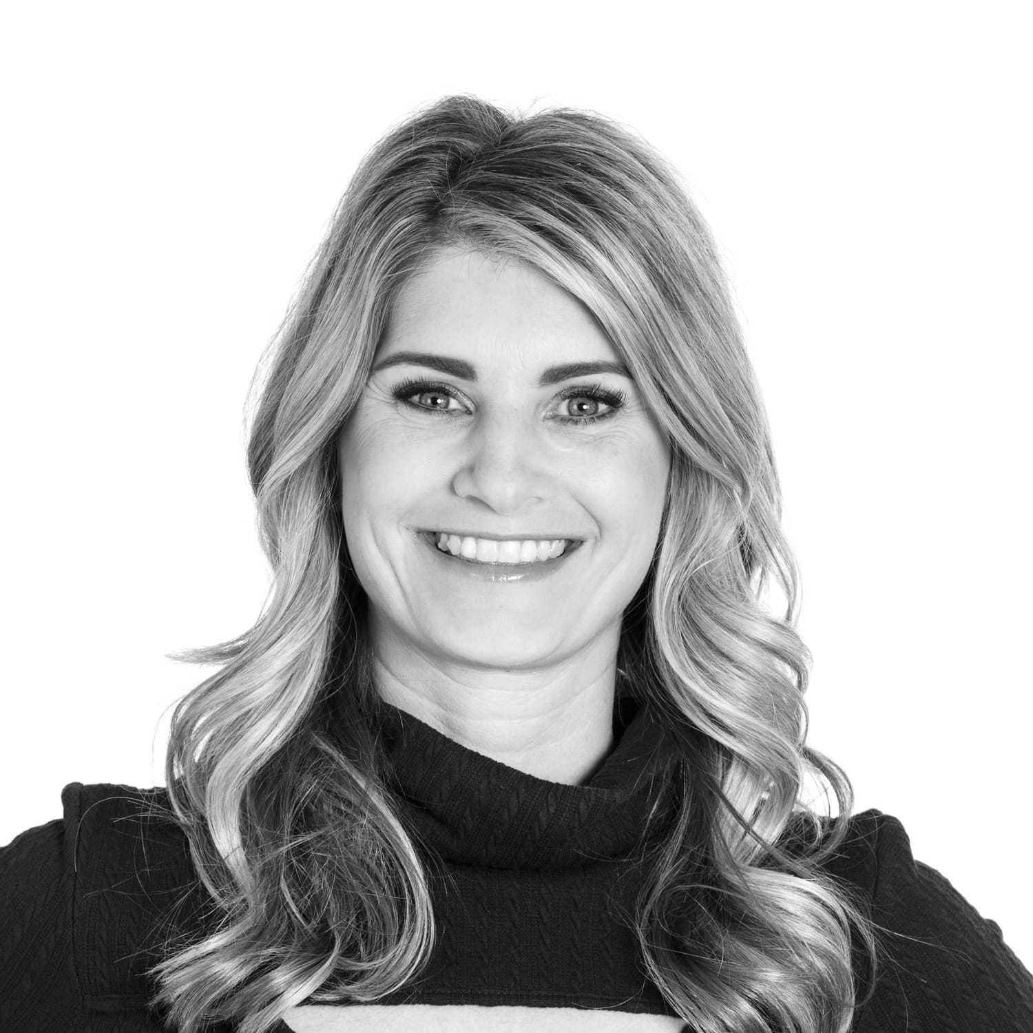 Portrait of Melanie Bauman, a professional stylist at Dominic Michael Salon, showcasing their expertise and style.