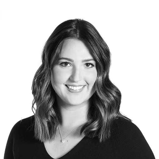 Portrait of Evie Alferman, a professional stylist at Dominic Michael Salon, showcasing their expertise and style.