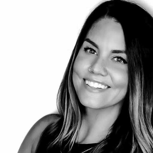 Portrait of Chelsey Firth, a professional stylist at Dominic Michael Salon, showcasing their expertise and style.