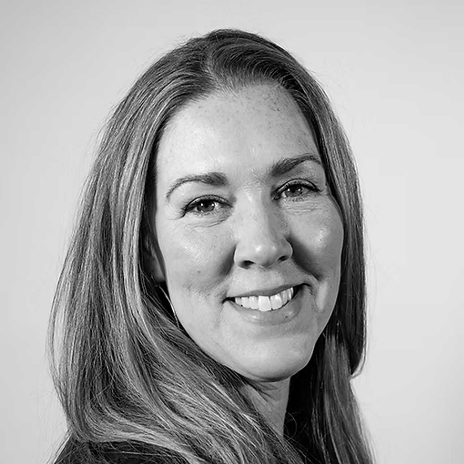 Portrait of Kristy Hobbs, a professional stylist at Dominic Michael Salon, showcasing their expertise and style.