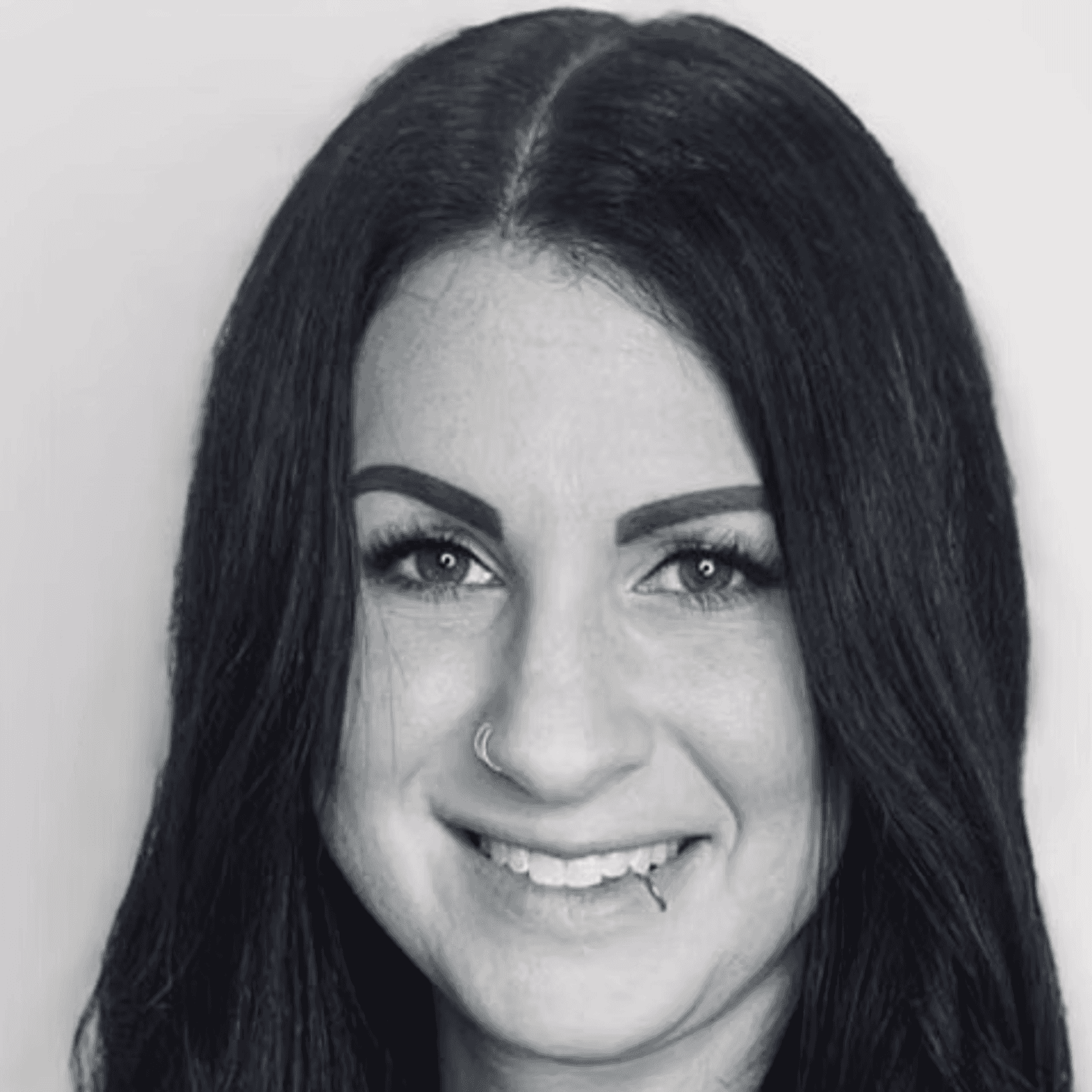 Portrait of Elisabeth (Lis) Schemerhorn, a professional stylist at Dominic Michael Salon, showcasing their expertise and style.