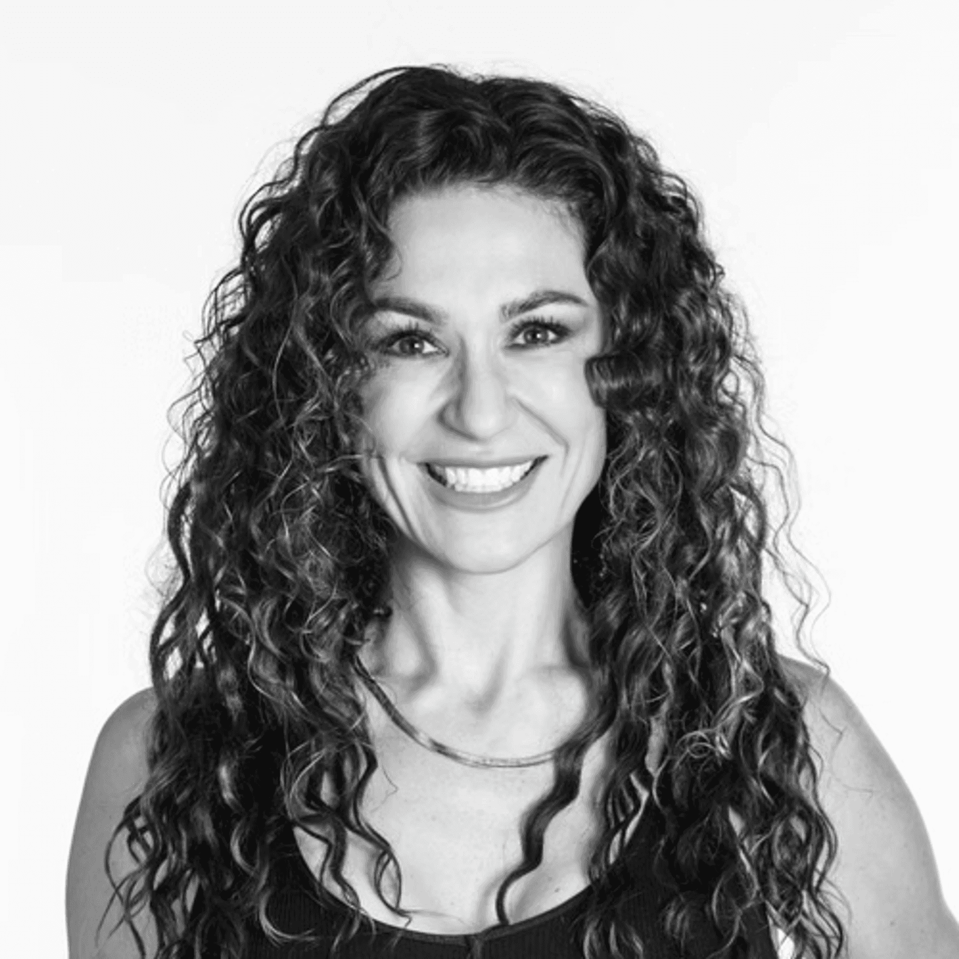 Portrait of Gena Mazzamuto, a professional stylist at Dominic Michael Salon, showcasing their expertise and style.