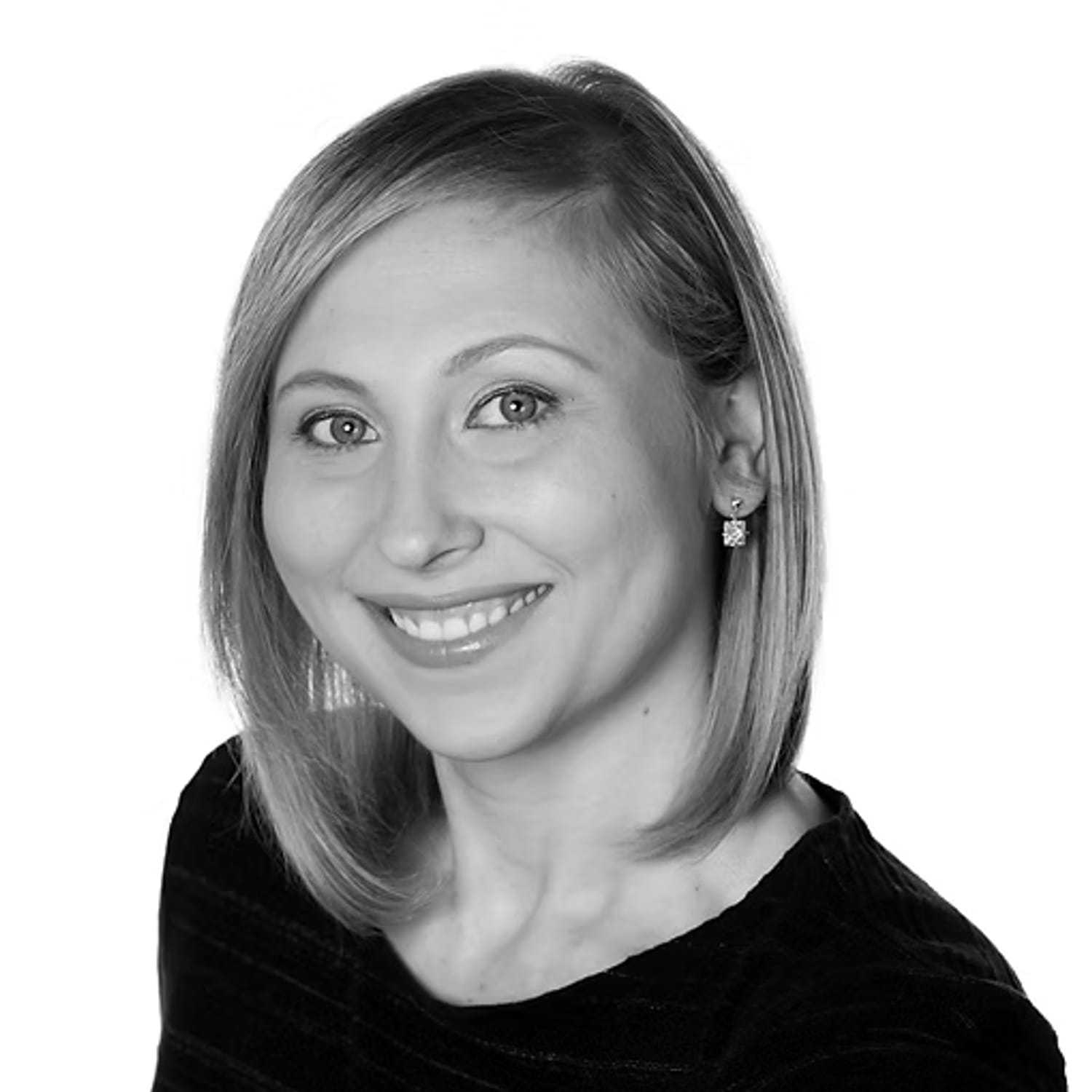 Portrait of Liliya Jackson, a professional stylist at Dominic Michael Salon, showcasing their expertise and style.