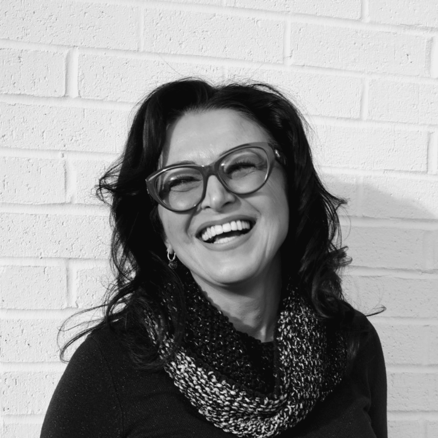 Portrait of Desi Vancheva, a professional stylist at Dominic Michael Salon, showcasing their expertise and style.