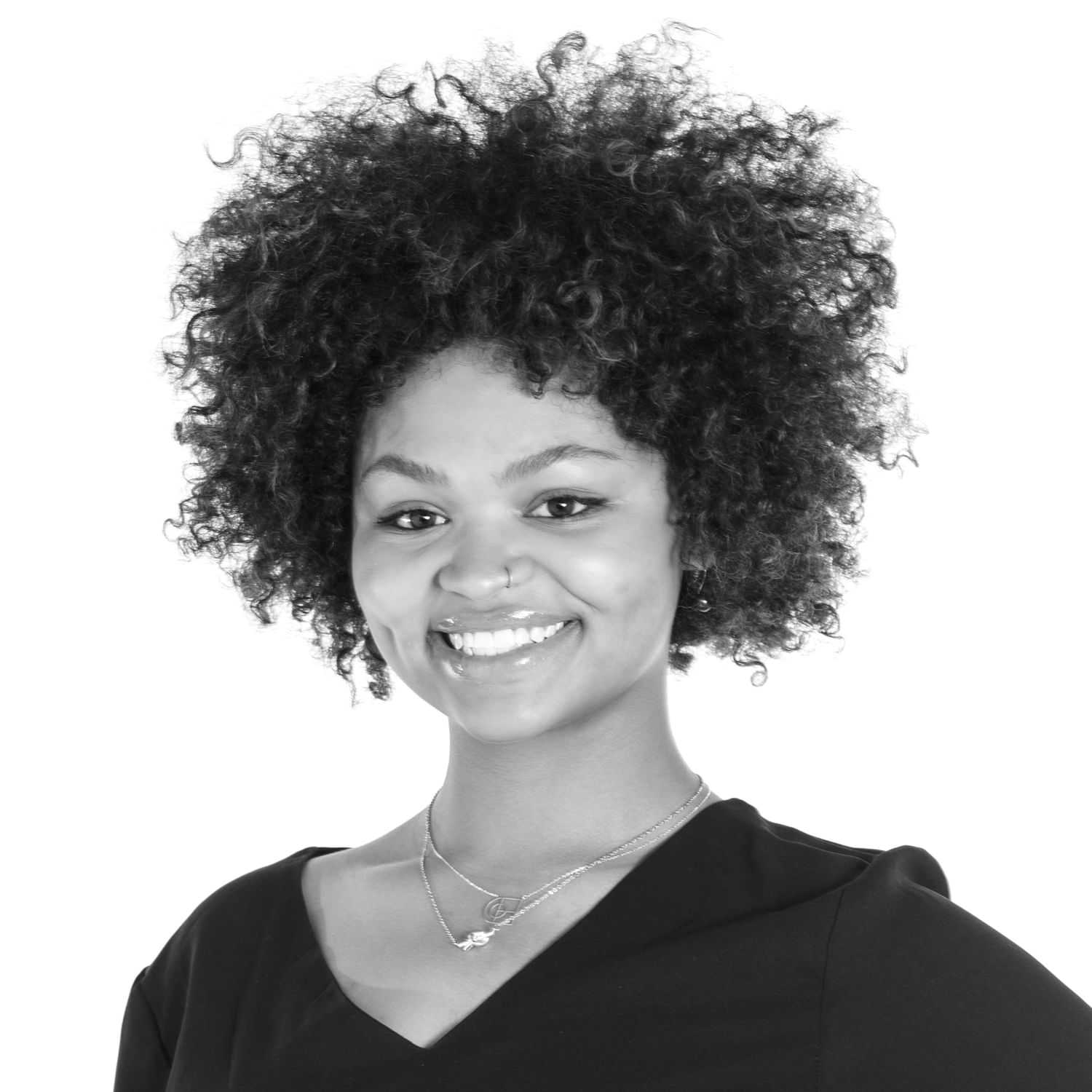 Portrait of Chloé McTague-Andrews, a professional stylist at Dominic Michael Salon, showcasing their expertise and style.