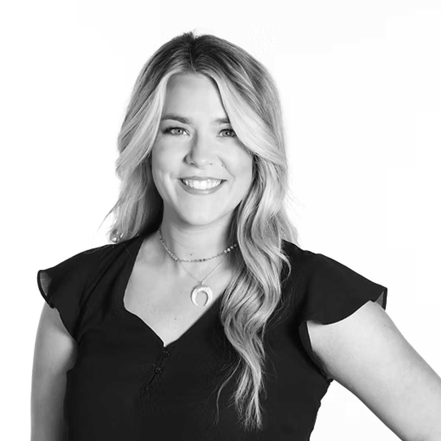 Portrait of Katie Middendorf, a professional stylist at Dominic Michael Salon, showcasing their expertise and style.