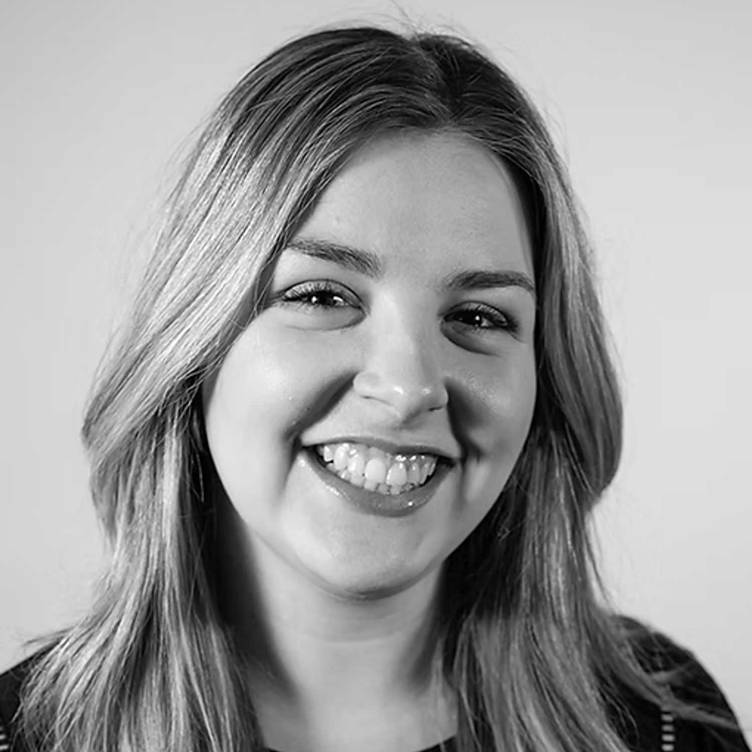 Portrait of Megan Jones, a professional stylist at Dominic Michael Salon, showcasing their expertise and style.