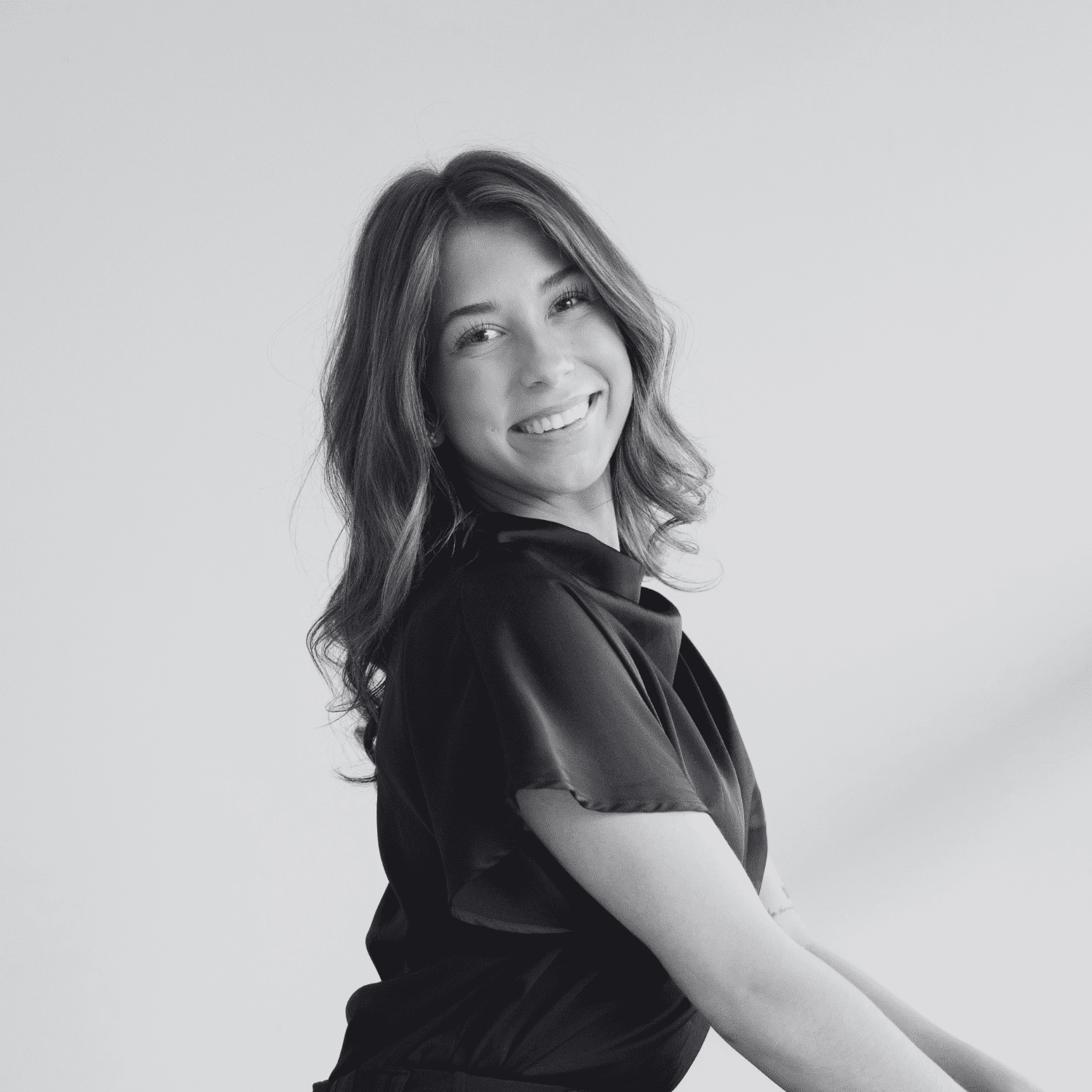 Portrait of Keaton Rubottom, a professional stylist at Dominic Michael Salon, showcasing their expertise and style.
